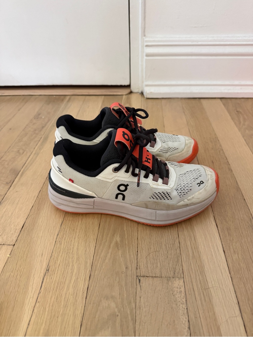 On Running Women's White Black Orange Athletic Shoes